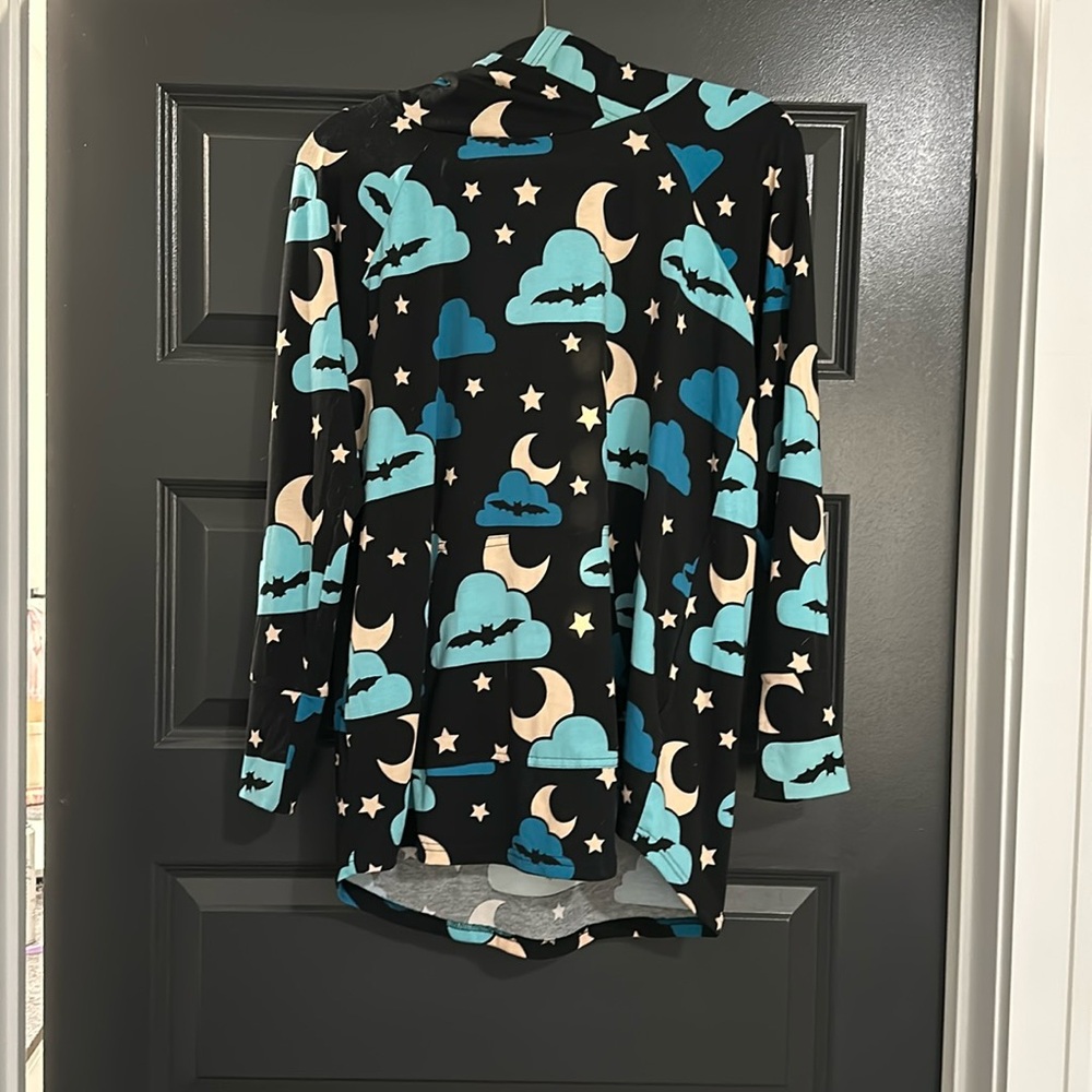 Halloween Lularoe Amber. It’s lightweight with black background and fun colors.